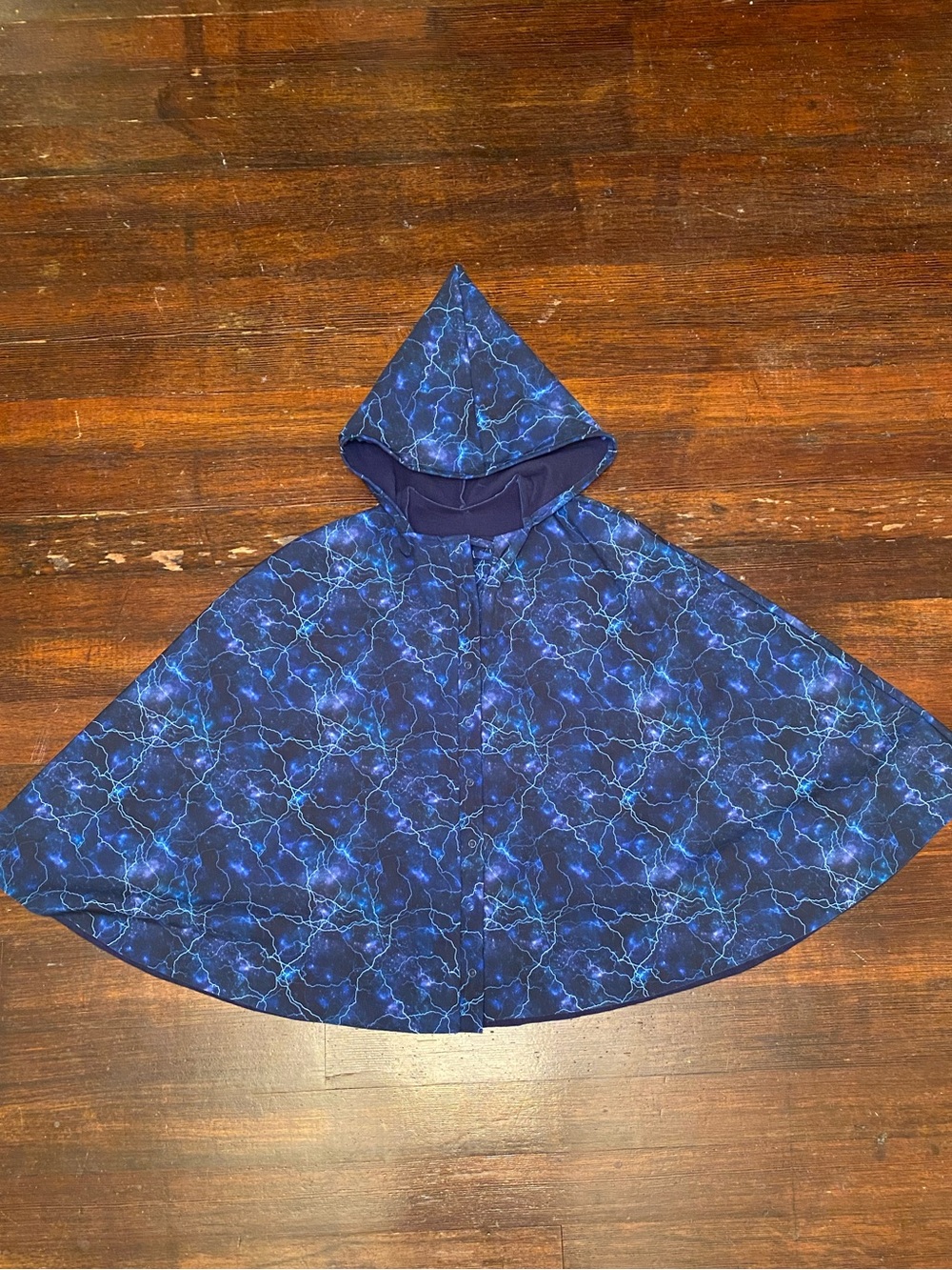 EUC Water Resistant Hooded Cape Jacket Navy Blue Lightning Print